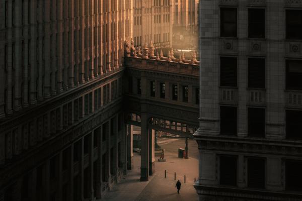 person-walking-on-street-between-buildings-3617457 (1).jpg